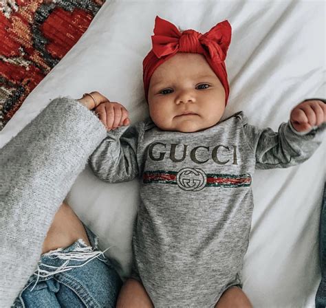 newborn baby wearing gucci|gucci newborn girl.